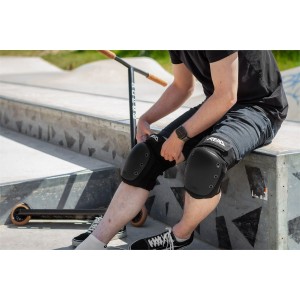 RKD620 REKD Ramp Knee Pads Black Putting On 1.jpg